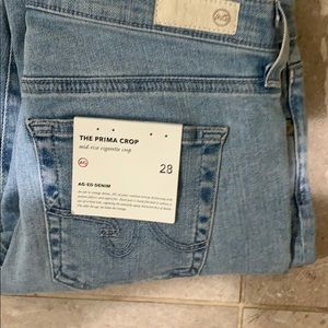 Mid rise cigarette crop light blue jeans.